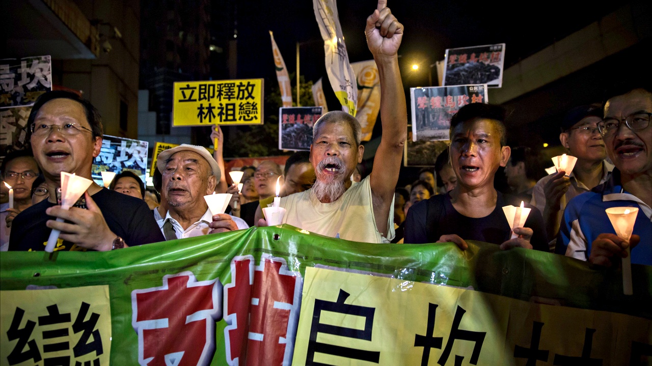 Гонконг: акция в поддержку протестов в китайской деревне