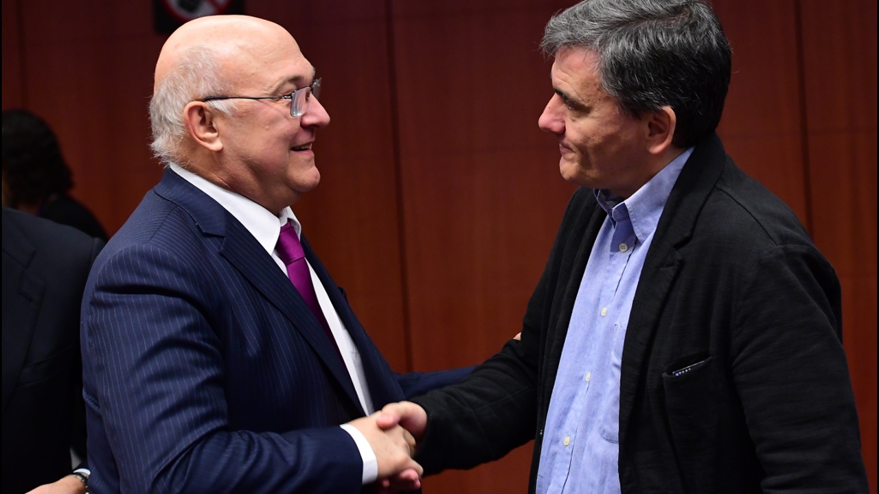 Еврогруппа утвердила меры по облегчению долгового бремени Афин
