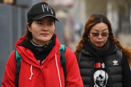 Жене заключённого китайского адвоката не дали завершить марш протеста