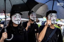 Протестующим Гонконга запретили надевать маски, но это их не остановило