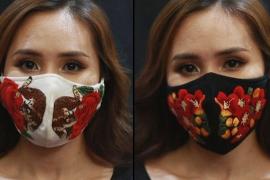 Во Вьетнаме медицинские маски украшают вышивкой