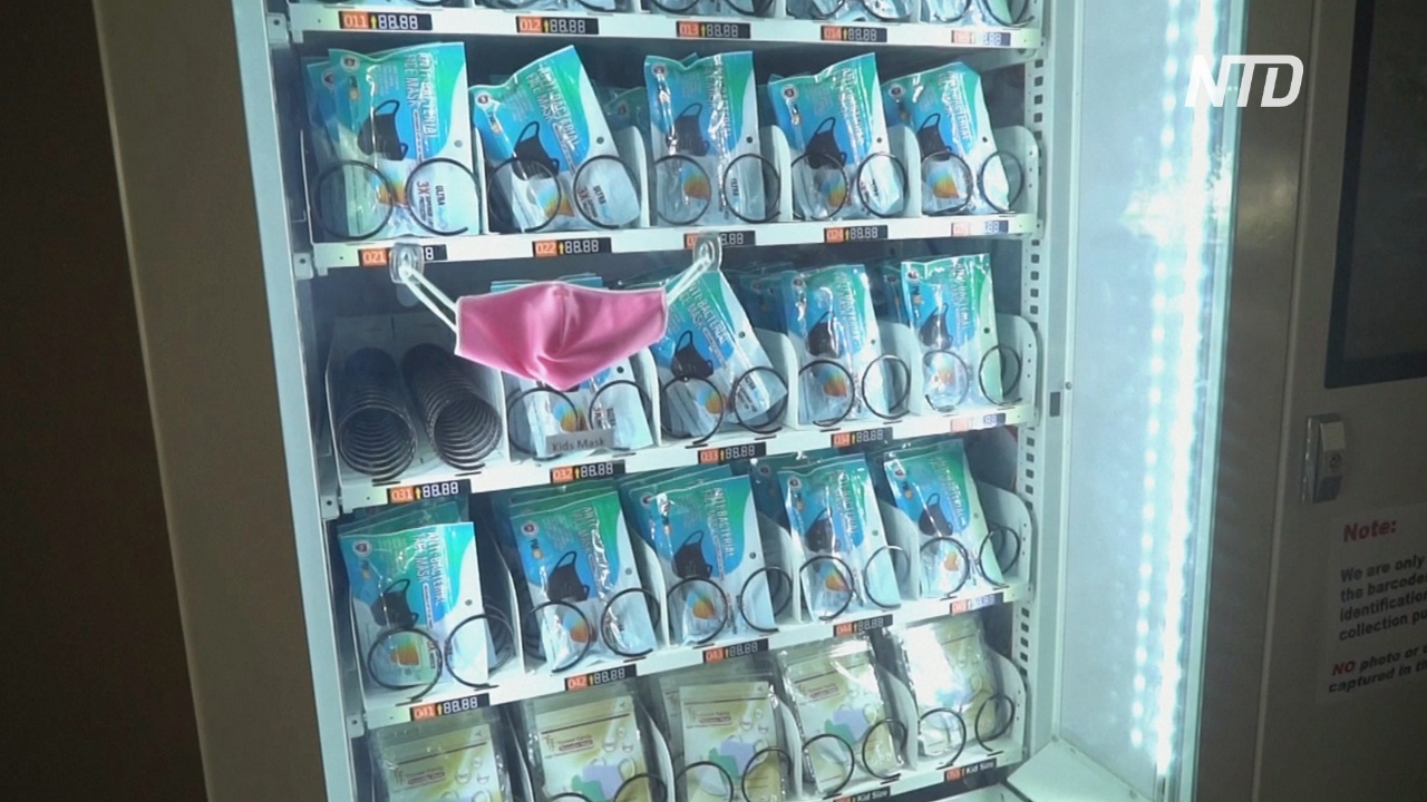 В Сингапуре появились автоматы с бесплатными многоразовыми масками
