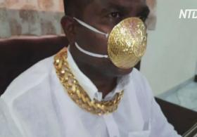 Пережить пандемию стильно: индиец ходит в золотой маске