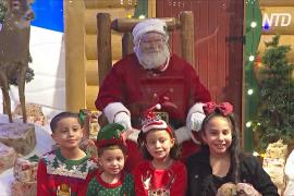Посидеть на коленке не получится: Санта-Клаусы в США встречают детей за оргстеклом