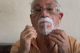 Бразильский художник разрисовывает маски, копируя половину лица