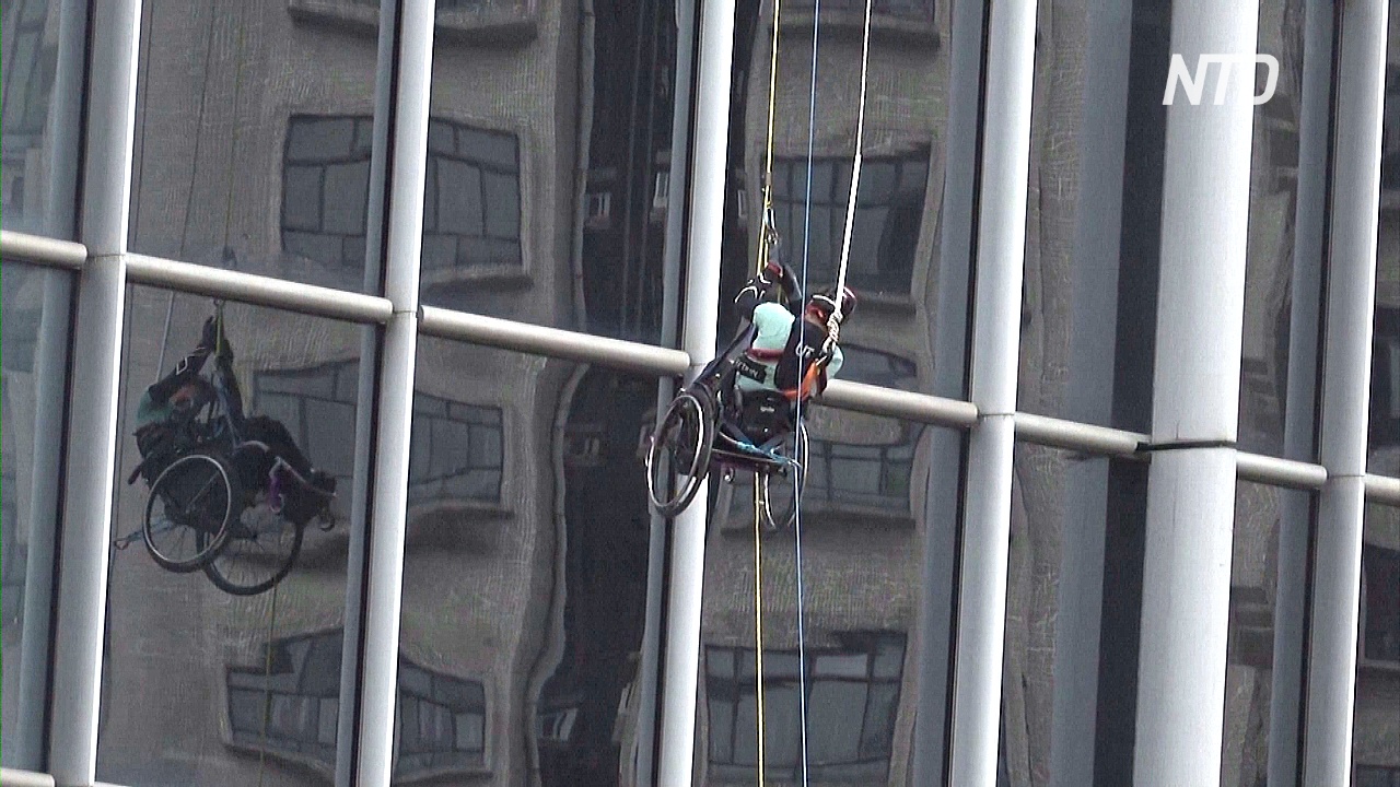 Как скалолаз в инвалидном кресле покорял 300-метровый небоскрёб