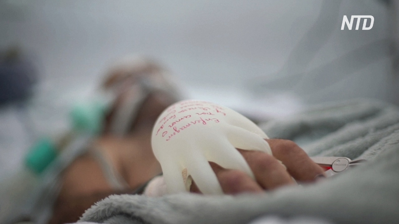 «Прикосновение любви»: как перчатки с тёплой водой помогают пациентам с COVID-19