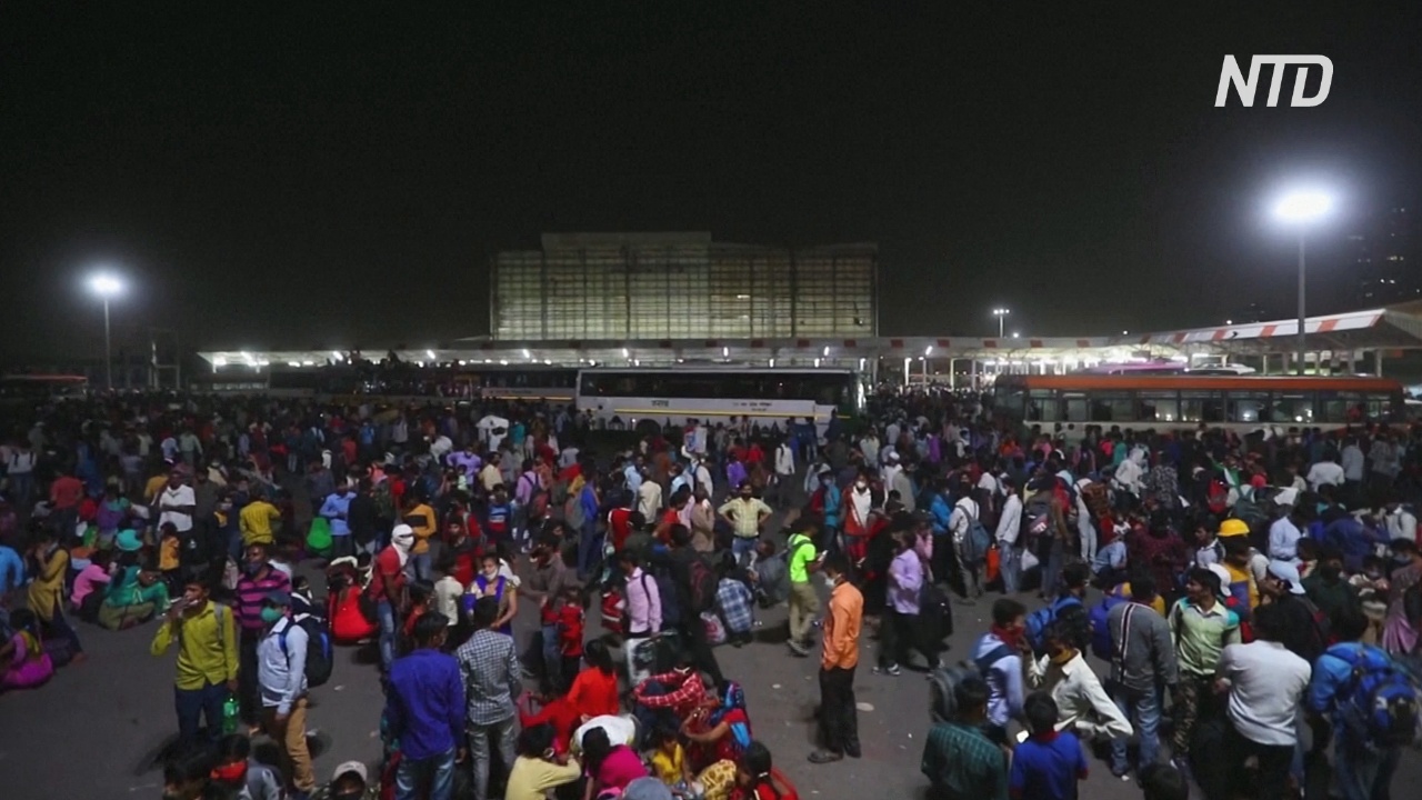 Рабочие-мигранты пытаются уехать из Нью-Дели из-за локдауна
