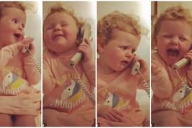 Малышка разговаривает по телефону. Весёлое видео