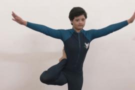 Девушка с синдромом Дауна творит чудеса йоги