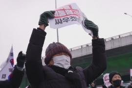 В Сеуле тысячи людей вышли с протестом за и против ареста президента Южной Кореи