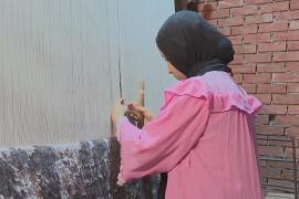 Египетские мастера ткут ковры и зарабатывают на жизнь