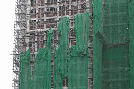 В Гонконге со всех зданий снимают строительную сетку