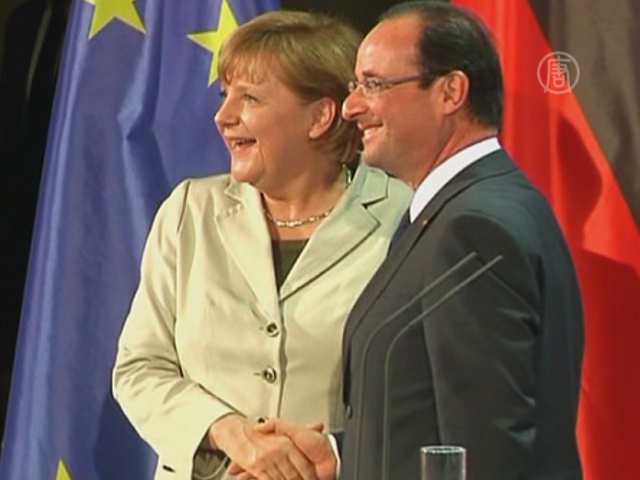 Молния не помешала встрече Олланда и Меркель