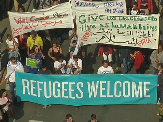 Бельгия: беженцев поддержали демонстрацией