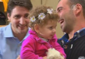 Премьер Канады встретил первых сирийских беженцев