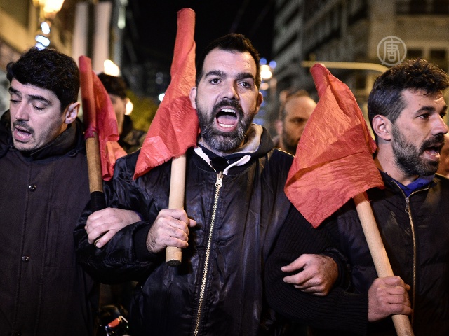 Греция: новые реформы приняли на фоне протестов