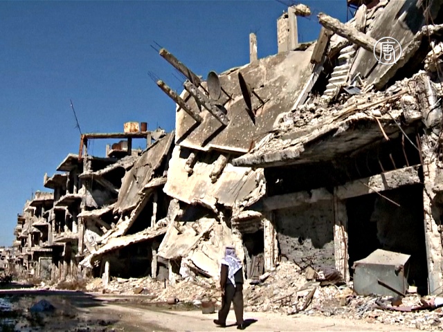 Жители Хомса возвращаются домой в руины