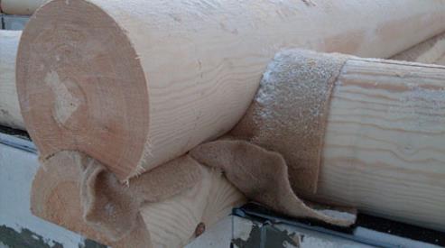 Преимущества эковаты в утеплении деревянных срубов